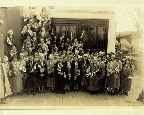 War Widows take photo on pilgrimage ship.