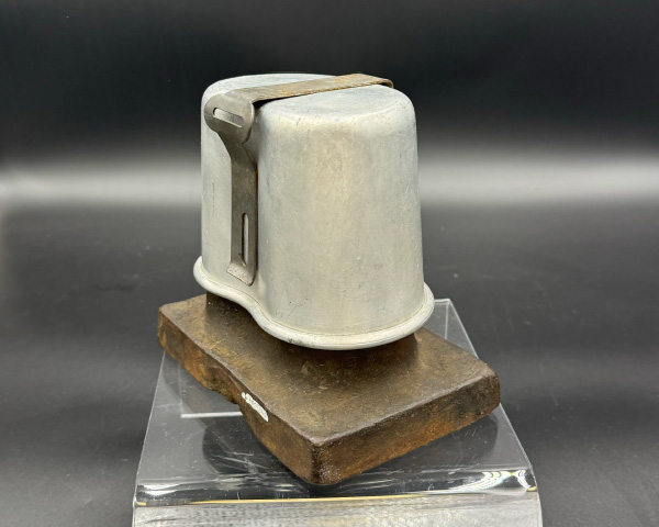 Canteen cup on top of forming die