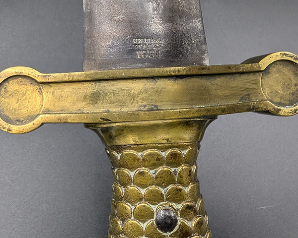 The 1834 stamp is visible below the hilt of the M1832 foot artillery sword.