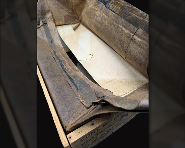 Interior cardboard box visible under the waxed liner.