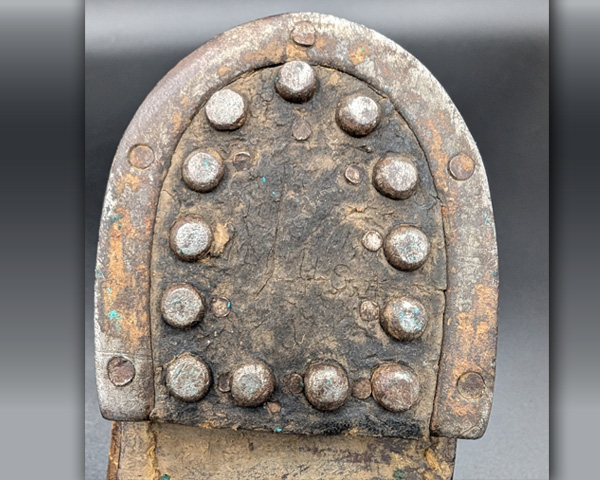 Heel plate and hobnails for traction.