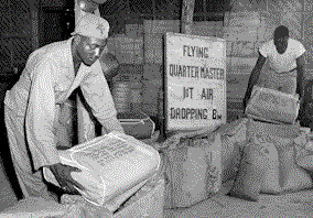 Quartermaster Soldiers shown maintaining Aerial Delivery supplies.