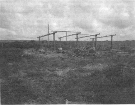 Unimproved site with girders from a former Soviet missile factory.